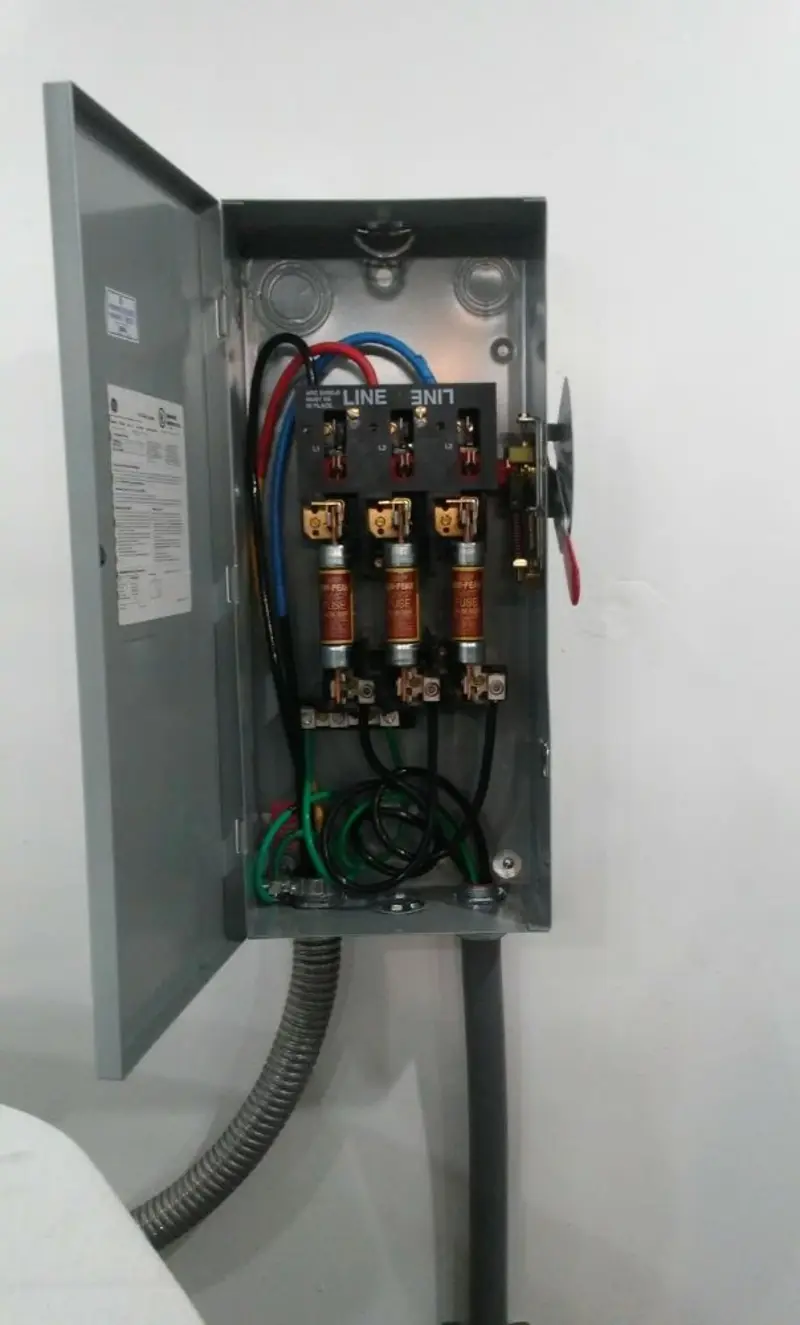 Three-phase disconnect switch installed for Smoke Detector Installation in World Golf Village